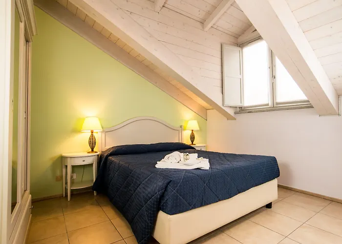 Santa Giulia E Aparthotel 4*